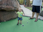 Playing mini-golf