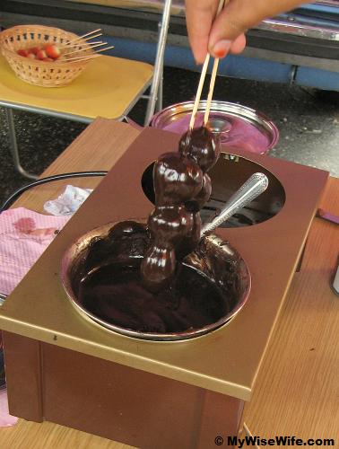 Then, hold a while and let the chocolate drips Then, hold a while and let the chocolate drips