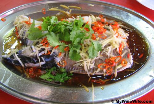 Mouth watering steamed fish head in soy sauce Mouth watering steamed fish head in soy sauce
