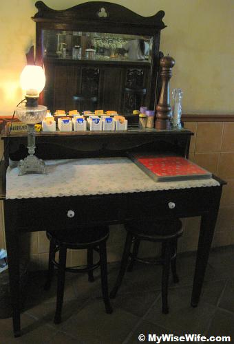 An antic dressing table is put in good use An antic dressing table is put in good use
