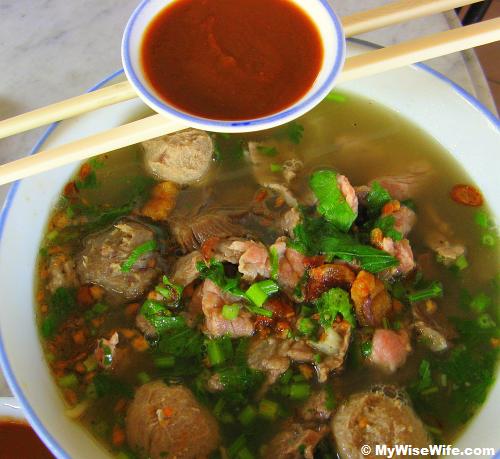 A big bowl with both beef balls and beef strips 