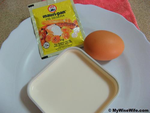 A pack of instant yeast, egg and coconut milk A pack of instant yeast, egg and coconut milk
