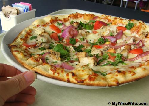 Pizza for lunch at Central Market Cafe - everything in Texas is BIGGER.. Pizza for lunch at Central Market Cafe - everything in Texas is BIGGER..