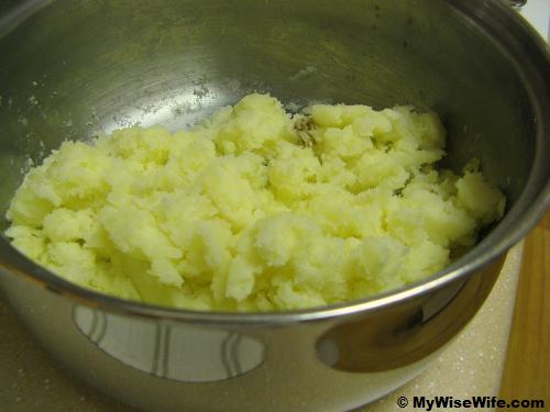 Mashed potatoes in saucapan Mashed potatoes in saucapan