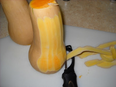 peeling butternut squash