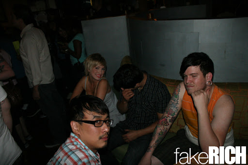 chick: cute.....left dude:annoyed....right dude:over this place