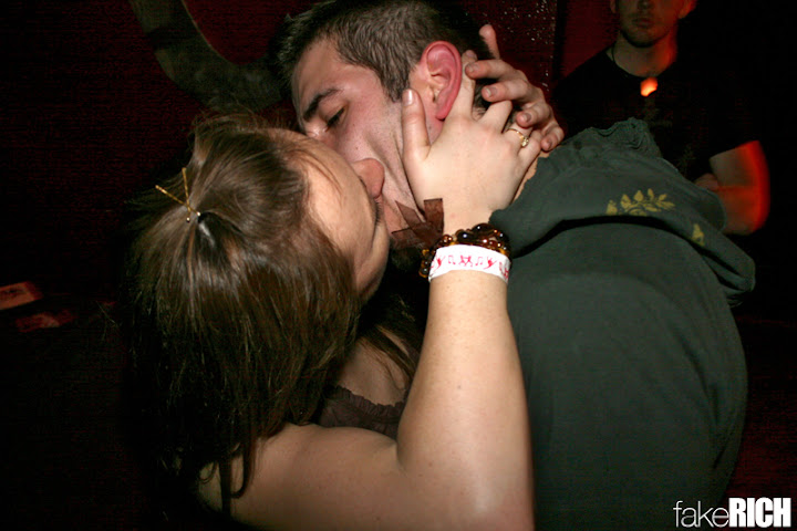 She is literally eating his face