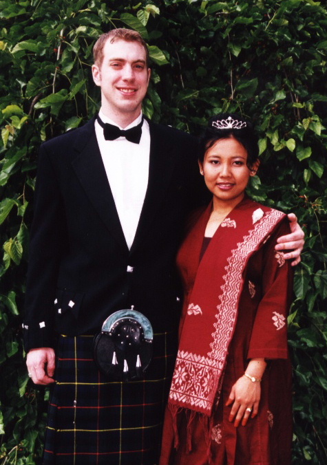 I wore the 'hunting tartan' of Clan MacLeod at our wedding reception.