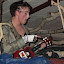 Amanda playing and singing.