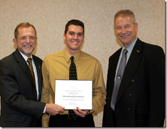 WMU President John Dunn (left) and Faculty Senate President John Jellies (right) present IME’s 2009 Presidential Scholar award to Jordan Avery, EGR senior