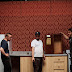 Production Designer, Manny Bocchieri (center) guides our crew with the construction of the kitchen