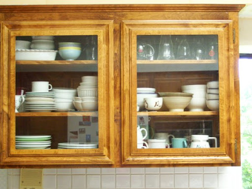 kitchen cupboard, reorganized but not necessarily decluttered