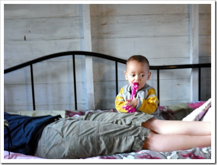 Oliver on the bed with Michaela