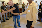 Group 1 are shaking hands....