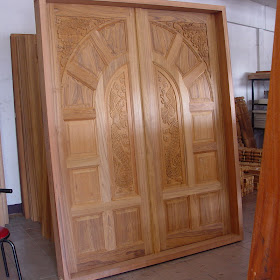 wood carved front doors for reference - Kerala home