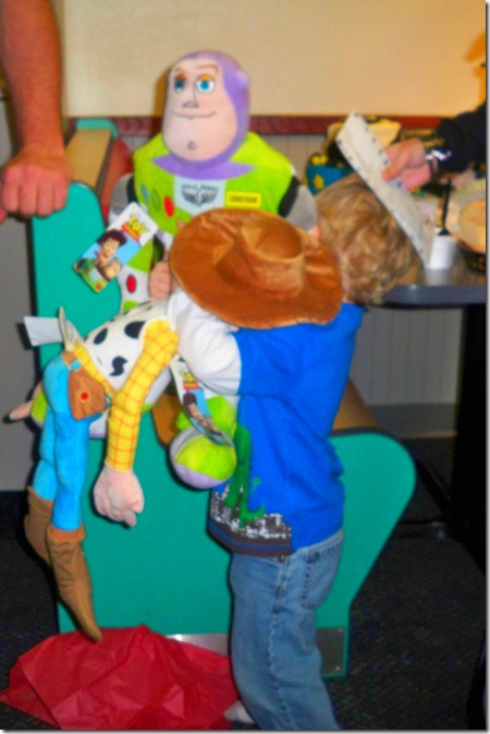 JACK LOVING HIS NEW BUZZ AND WOODY PILLOWS