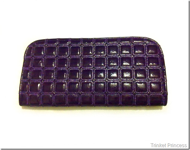 violetquilted patent clutch bag