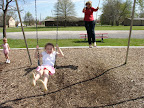 Maryke and Nana on the swings