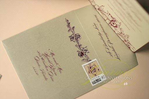 Gold outer envelopes were designed with a purple flower engraving and 