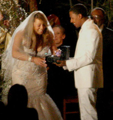 Mariah renews her wedding vows in a tight ass wedding dress