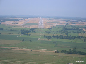 Landing at an undisclosed base in Italy.