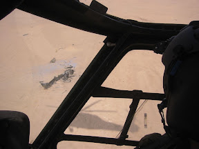 23May03: Flying over the wreckage of a British Tornado that had been intercepted by a US Patriot missile at 3:30am.
