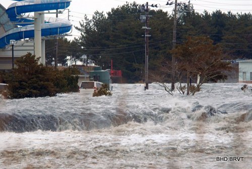 The area is flooded by tsunami in Iwaki, Fukushima Prefecture (state) as Japan was struck by a magnitude 8.9 earthquake off its northeastern coast Friday, March 11, 2011. (AP Photo/Kyodo News) JAPAN OUT, MANDATORY CREDIT, FOR COMMERCIAL USE ONLY IN NORTH AMERICA
