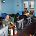 The lan center, with Jerms in the front, reload behind him in the green and FrooP and sic_mUnky watching something.