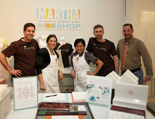 Chad Wagenheim (on left) & his retail staff, sold Martha Stewart Crafts products, as well as aprons, T-shirts, and a custom-made 'Ford Warriors in Pink' stamp kit.