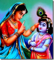 Mother Yashoda chastising baby Krishna