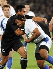 Bastareaud being tackled by All Black Isaia Toeava