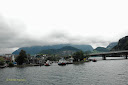Ships emerging from the dockyard of a small habitat on lake Lucerne in Switzerland -Thumbnail