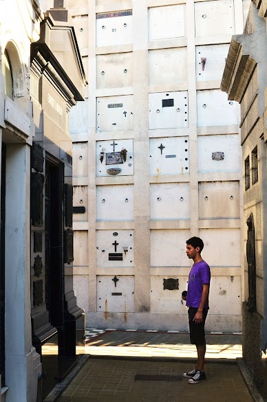 Dani and a giant wall of tombs DSC_4315.JPG