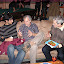 ProAm hosts Bob Good and Steve Craxton pondering the meaning of life with Pakistani squash pro, Arshad Burki at the Friday night "Party with the Pros"