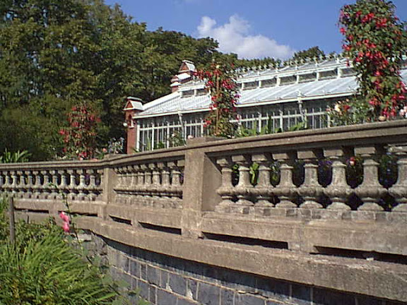 Stone wall in the city garden