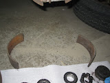 Normally, when you remove the brake drums, the shoes are NOT supposed to come out without removing the mounting hardware. Too bad, they had a fair bit of meat left.