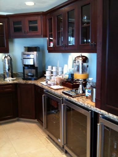 a kitchen with a coffee machine and coffee maker