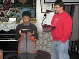 David reading scripture for Scott at the Home of God's Love