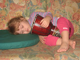 Mollie fell asleep while holding this drum