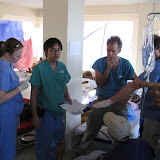 Lauren and some of the Doctors discuss a patient in the ER.