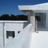The roof, the roof is not on fire, but is bright. Chris tries to hide in the shade.