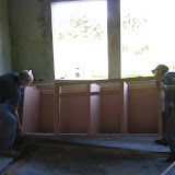 The cabinets start to go in.