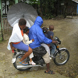 A moto ride home from school.