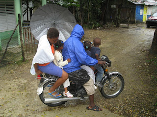 A moto ride home from school.
