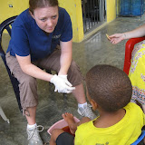 Lauren consults with a student about a toe injury.