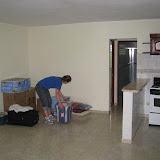 The kitchen and dining room and living room.