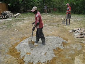 Step 4: Spread the cement out on top of the sand