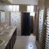 The large bathroom.