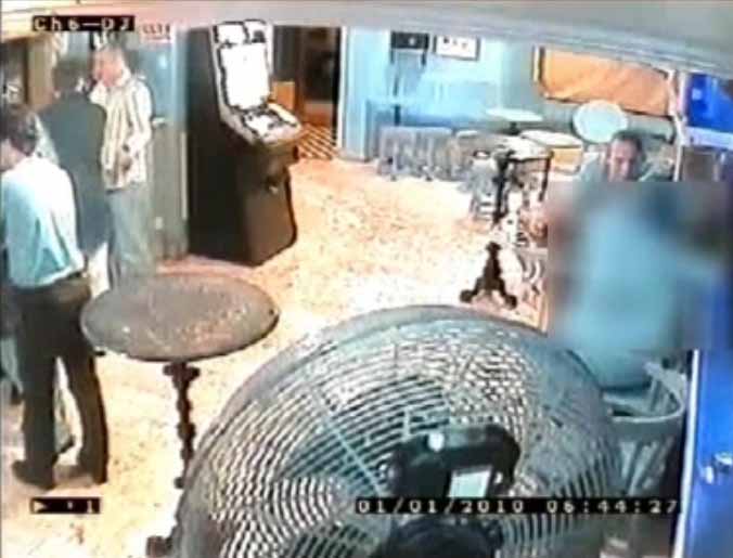 A still from CCTV footage of a suspect being sought in connection with a sex attack in Morecambe on New Year's Day. The suspect is shown above the blurred square on the screen (the blur is concealing the victim).