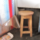 Later we scored a sweet upgrade.  The wooden stool next to the baño.